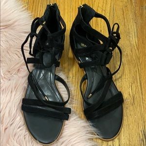 Never worn Isola black sandals, .5 in. Heel